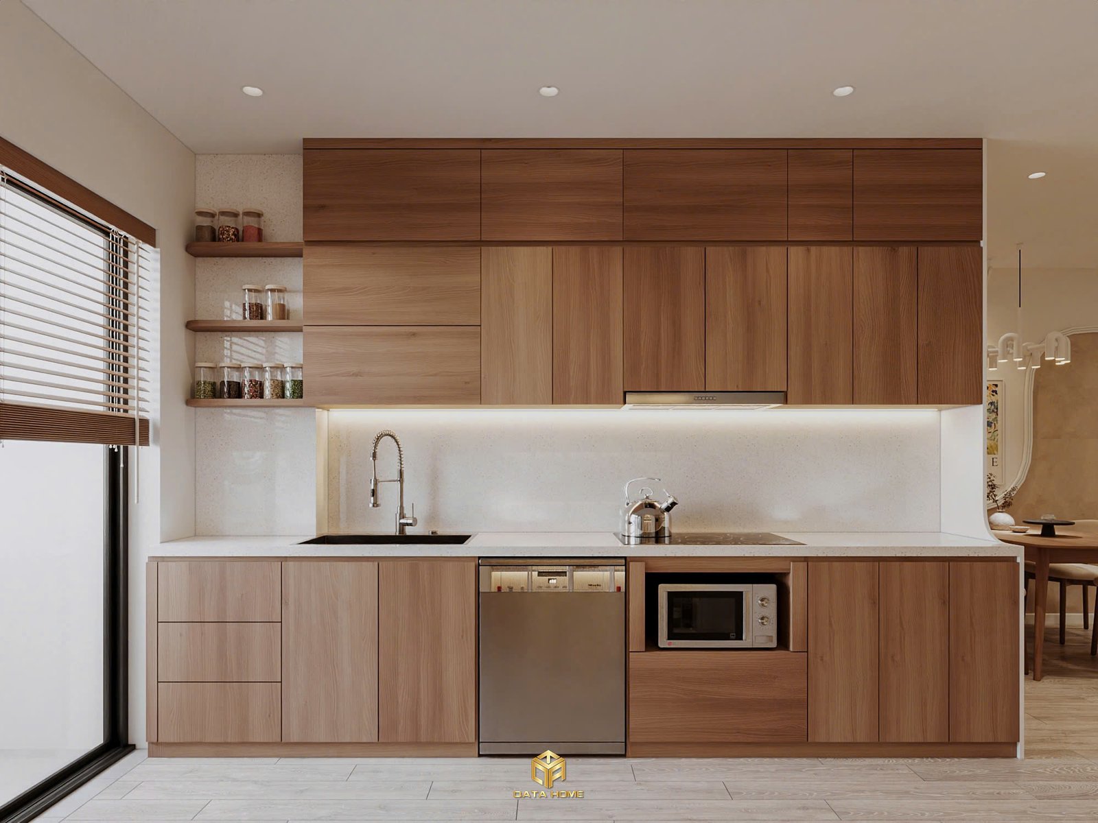 Khu bếp trong căn hộ sử dụng chất liệu gỗ tự nhiên kết hợp ánh sáng âm, thể hiện rõ tinh thần thiết kế nội thất tối giản và ấm áp.